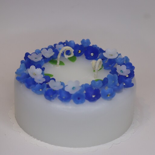 شمع استوانه ای گل گلی طیف آبی قابل سفارش دو فیتیله نخی پارافین  گل دستساز شمع کیکی