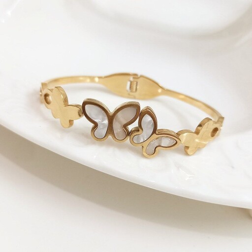 دستبند النگویی طرح طلا مدل پروانه صدفی