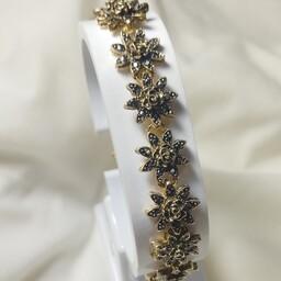 دستبند زنانه سیاه قلم طرح گل برجسته 