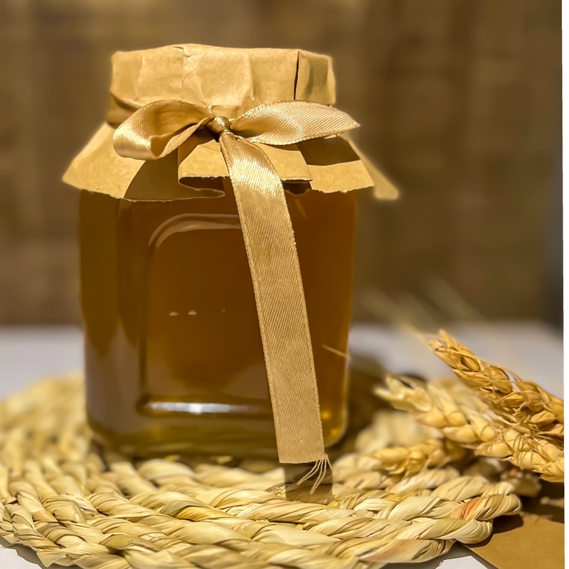 عسل طبیعی آداس بدون هیچ گونه افزودنی  و طعم دلپذیر وتضمین در کیفیت
