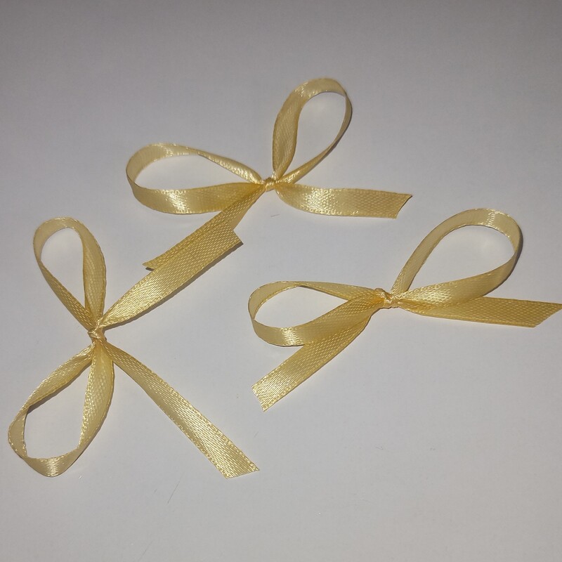 پاپیون باریک طلایی رنگ برای جعبه کادویی و تزیین پاکت بسته ی ده عددی 