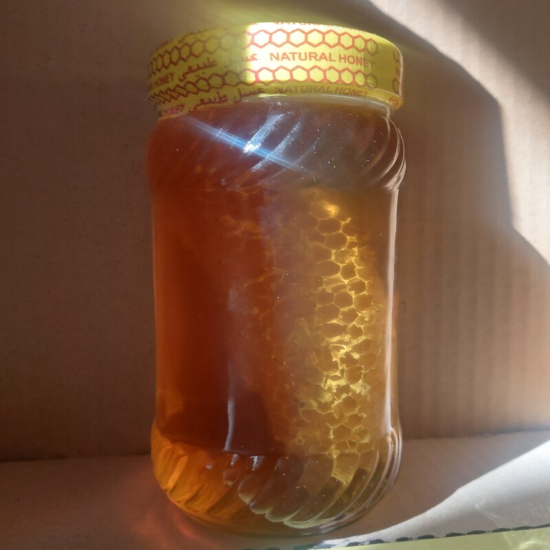 عسل موم دار طبیعی گون شیشه 1 کیلویی محصول آجیل و خشکبار روناس