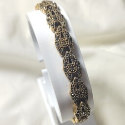 دستبند زنانه بسیار شیک و خاص با نگین های مارکازیت مشکی 