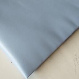 پارچه ی ساتن آمریکایی عرض 150 جنس خوب تک رنگ رنگ آبی آسمانی قیمت به ازای نیم متر 