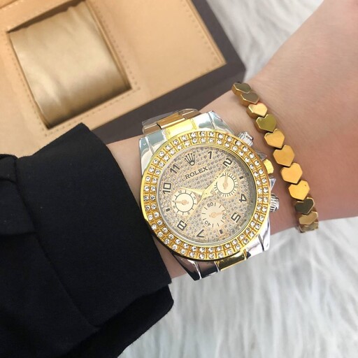 ساعت زنانه رولکس نگین دار  بند استیل طلایی همراه با دستبند اشانتیون 