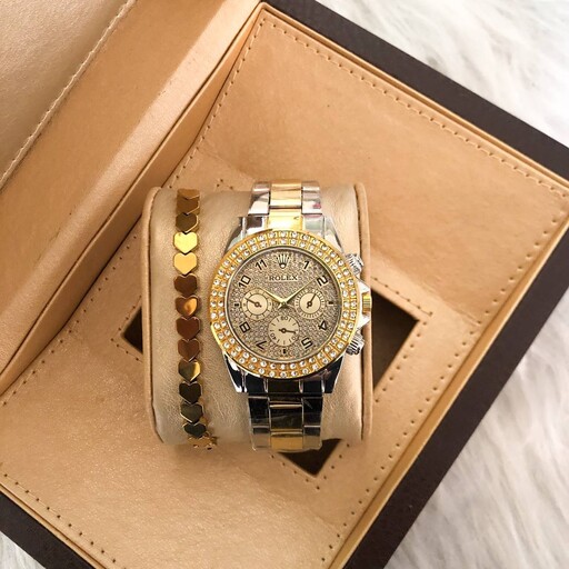 ساعت زنانه رولکس نگین دار  بند استیل طلایی همراه با دستبند اشانتیون 