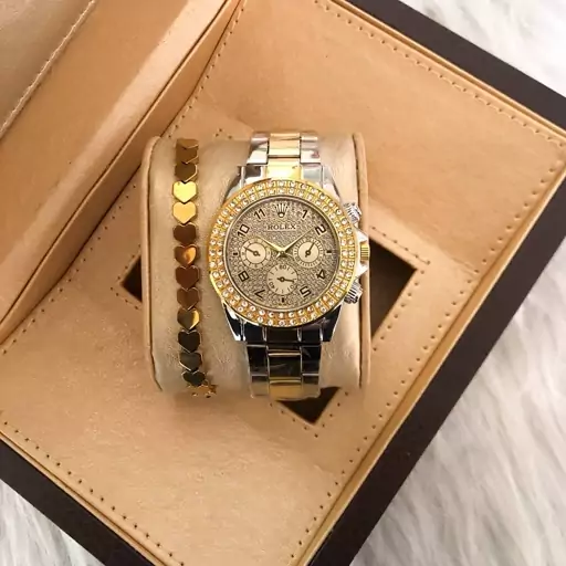 ساعت زنانه نگین دار 
بندفلزی دورنگ طلایی صفحه طلایی مارک ROLEX 
