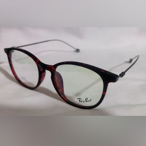 عینک طبی زنانه مارک ریبن Ray. Ban  مدل C181 3159 فرم فریم گرد با  رنگ قرمز هاوانایی.  طرحی جذاب و خاص و بسیار بسیار سبک