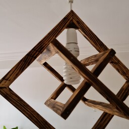 لوستر چوبی ساخته شده باچوب نراد و تماما کار دست قابل سفارش در رنگ های کرم و قهوه ای