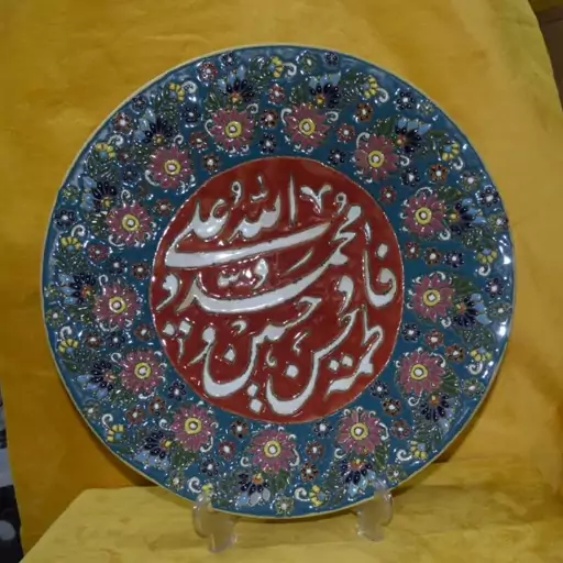 دیوار کوب سفالی .رنگ سبز ابی.طرح میناکاری.کوره رفته .لعابدار.قطر35سانت.کاردست.