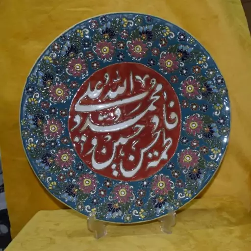 دیوار کوب سفالی .رنگ سبز ابی.طرح میناکاری.کوره رفته .لعابدار.قطر35سانت.کاردست.