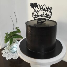 کیک تولد خامه ای تمام مشکی 