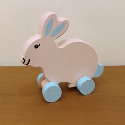 اسباب بازی خرگوش چوبی چرخدار متحرک  رنگ شده مناسب سیسمونی و بازی کودک رنگا چوب