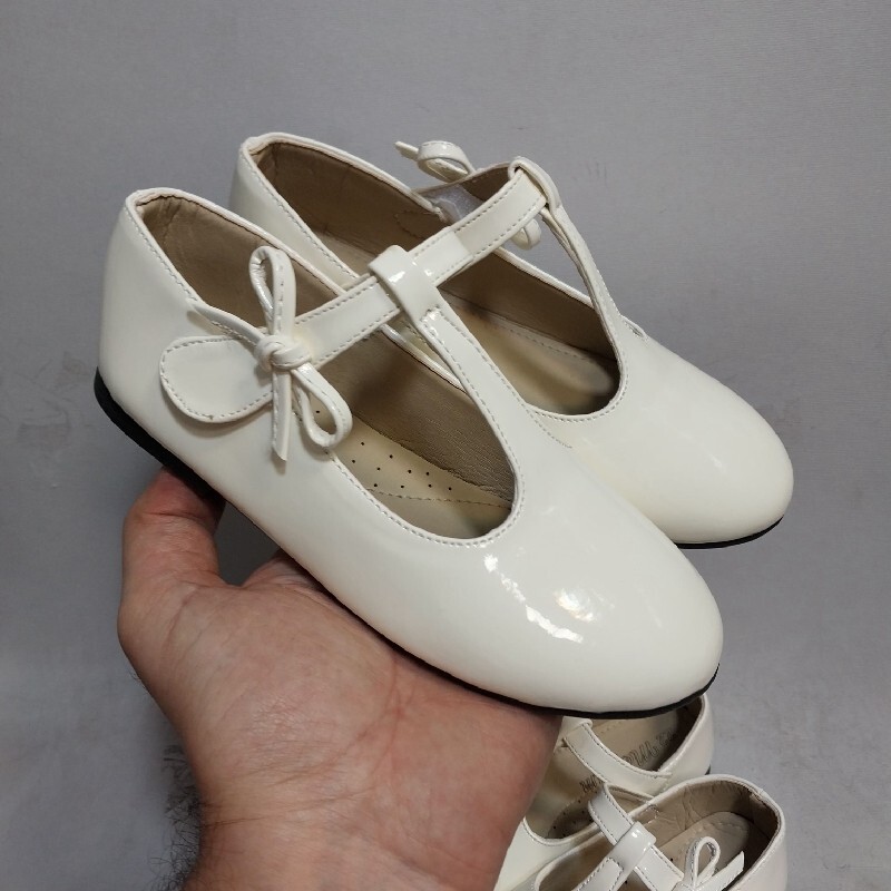 کفش عروسکی دخترانه پاپیون دار سفید کرم (سایزبندی 22 تا 30 موجود) ارسال رایگان 