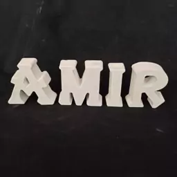 استند اسم امیر به صورت خام با فونت رومی ، استند انگلیسی حروف AMIR فونت رومی بدون رنگ ، جنس سنگ مصنوعی