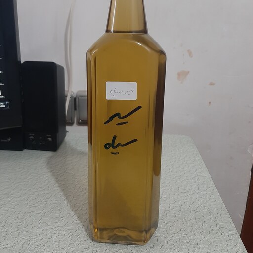 روغن سیر سیاه خوراکی اصل و خالص نیم لیتری (پرپشت کننده مو پرپشت کننده ابرو تقویت مژه تقویت ریش و سبیل )