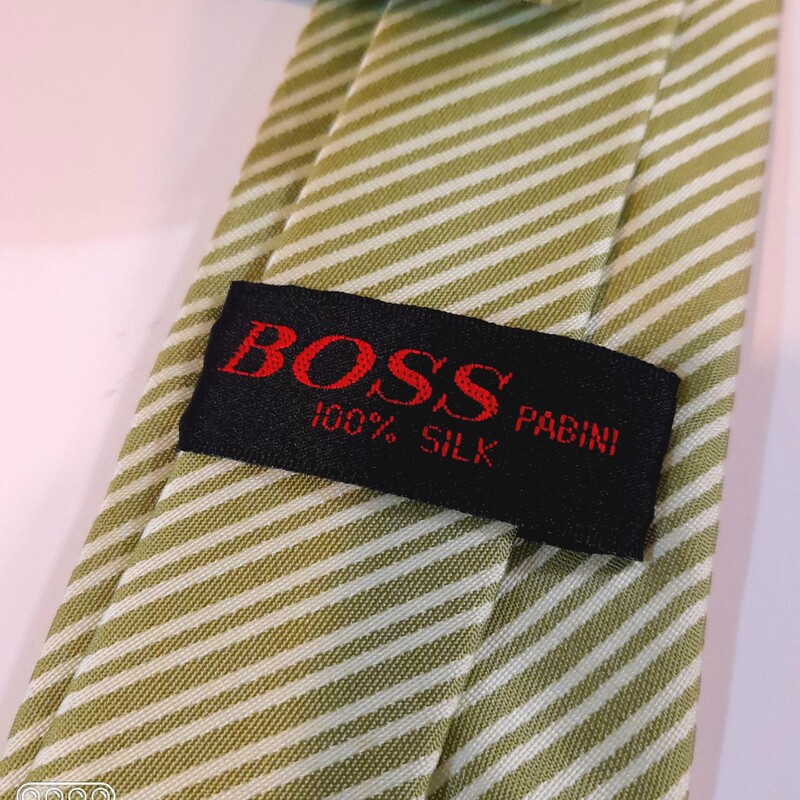 کراوات مردانه طرحدار رنگ زمینه سبز روشن با خط های مورب سفید