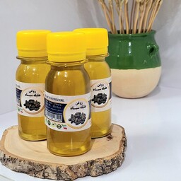 روغن هلیله سیاه اصل 60 سی سی خالص سنتی جوان ساز و کمک به سفید نشدن مو