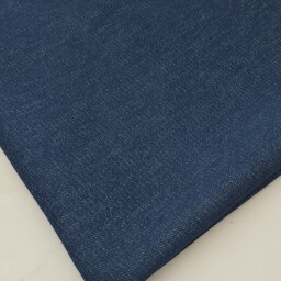 پارچه ی لی جین جنس خوب عرض 150 تک رنگ رنگ آبی تیره 