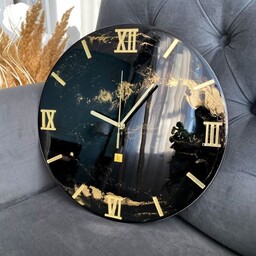 ساعت رزینی مشکی با رگه های طلایی سایز 50 سانت قابل سفارش در سایز های مختلف