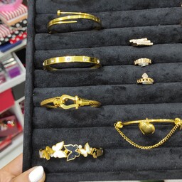 دستبند النگویی استیل طلایی زنانه دخترانه،رنگ ثابت تضمینی ، مناسب استفاده روزانه و هدیه