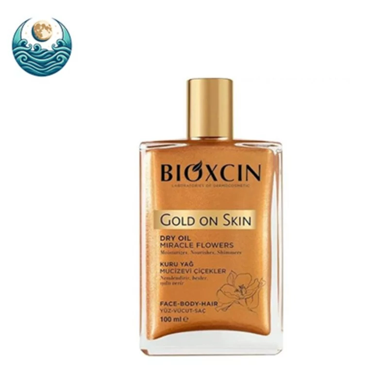 روغن مرطوب کننده و شاین صورت بدن و مو بیوکسین مدل Gold On Skin حجم 100 میل