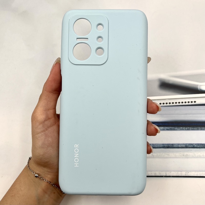 قاب گوشی Honor X7A آنر سیلیکونی پاک کنی اورجینال داخل پارچه ای رنگ آبی آسمانی محافظ لنز دار کد 142012