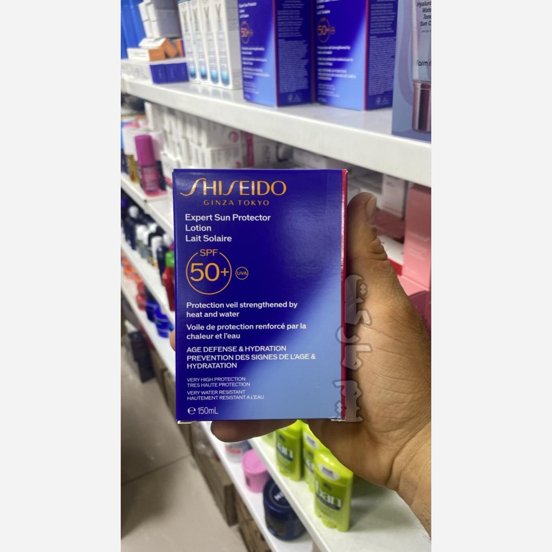 لوسیون ضد آفتاب شیسیدو مدل EXPERT SPF50 برای صورت و بدن بی رنگ حجم 150 میل اورجینال