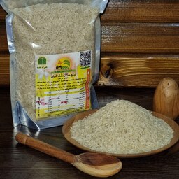 برنج دوساله ممتاز دشت لنجان(چمپا سرخه) برای تست بسته 900 گرمی معادل6 پیمانه به همراه سبوس