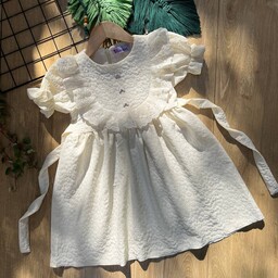 پیراهن و سارافون دخترانه مجلسی سفید شیری ژاکارد پفکی تابستانه لباس بچگانه 2 سال تا 9 سال