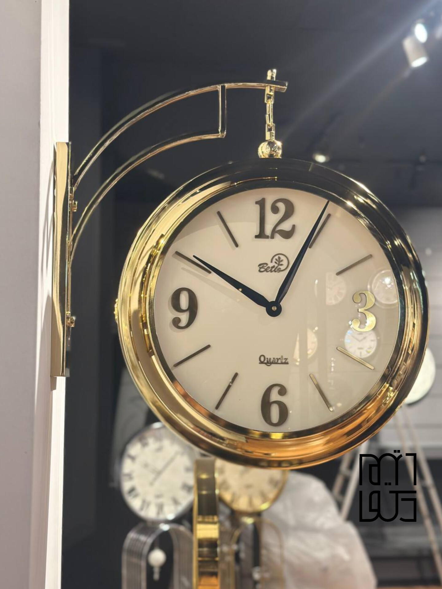ساعت دیواری دوطرفه فلزی بتیس کد 5045