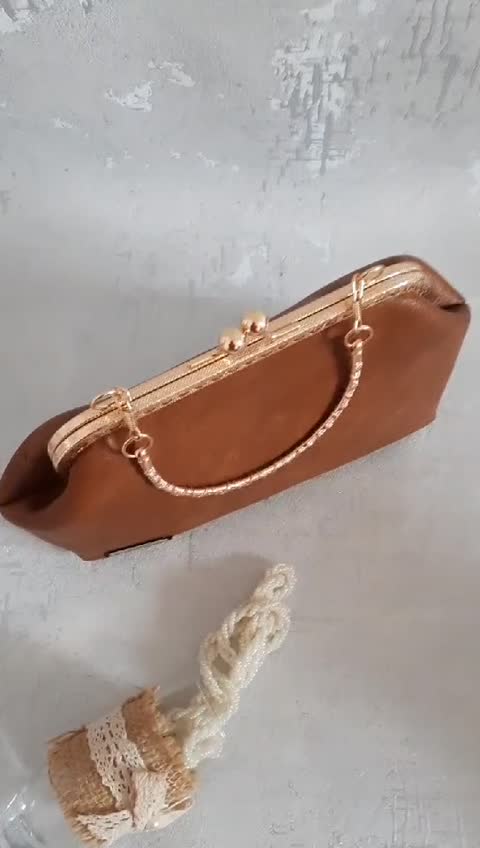 کیف دهانه فلزی چرم درجه یک