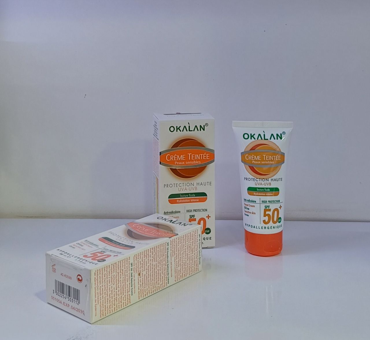 کرم ضدآفتاب رنگی ایدهآل OKALAN با حجم 50 میل