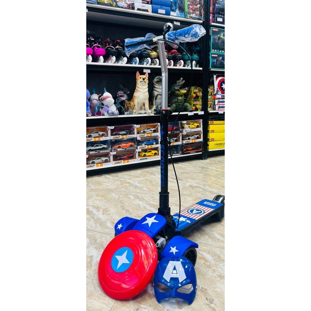 اسکوتر 3 چرخ فنری کاپیتان امریکا چرخ ژله ای چراغ دار موزیکال همراه با زنگ و ترمز جلو آیتم 2011