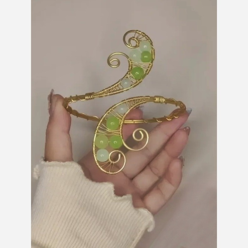 بازوبند 38 ( اکسسوری/ مچ بند/ دستبند/ تاج/ سیمی/ مفتولی/ الف/ الفی/ استیل/ رنگ ثابت/نقره ای /طلایی/ نگین دار/مجلسی/سبز)