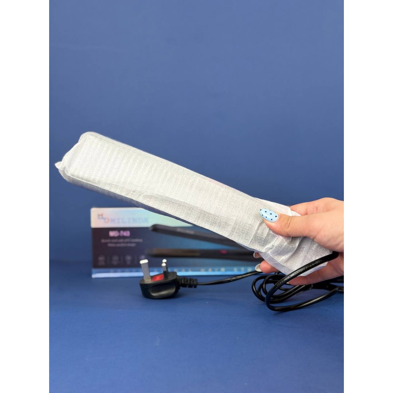 اتو موی اورجینال میلندا مدل MD743 تنظیم دما تا 220 درجه (4 حالت) و کابل 1.8 متری