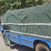 چادر نیسان برزنت 9 لایه ضد آب با دو ردیف قلاب و دم اسبی سایز 3 5 در 4 5 کپی