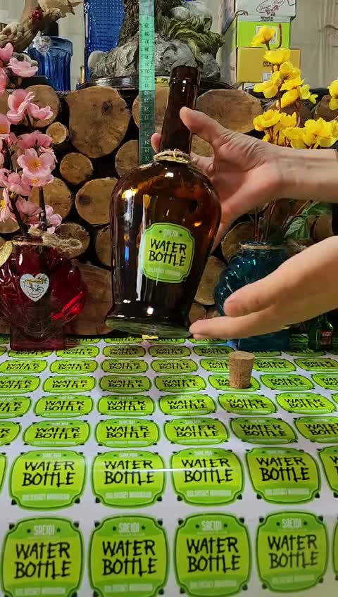 بطری شیشه قهوه ای مژگان با حجم 900سی سی با درب چوب پنبه وارداتی محصولی دست ساز پس کرایه