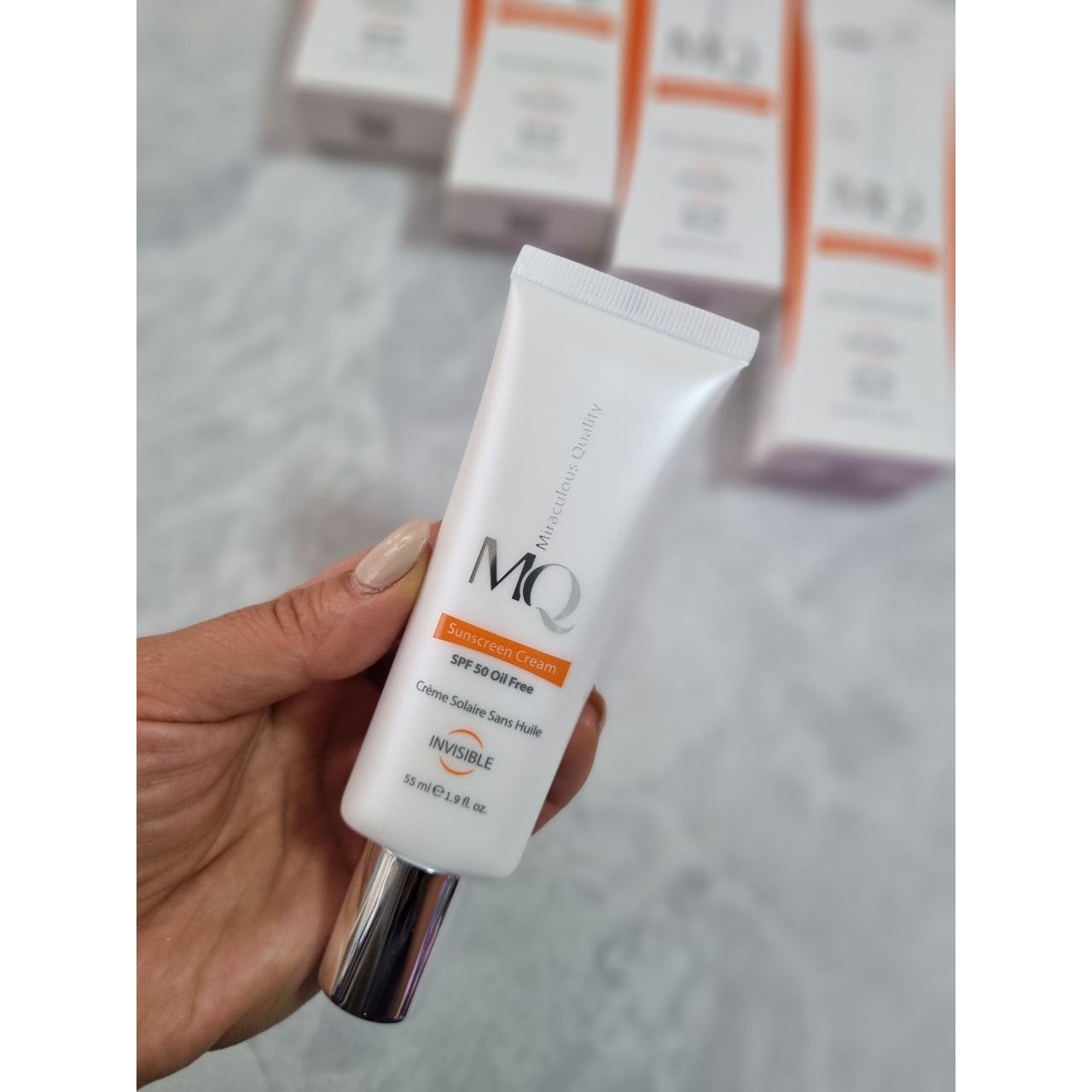 ضد آفتاب بی رنگ MQ ام کیو پوست چرب spf50