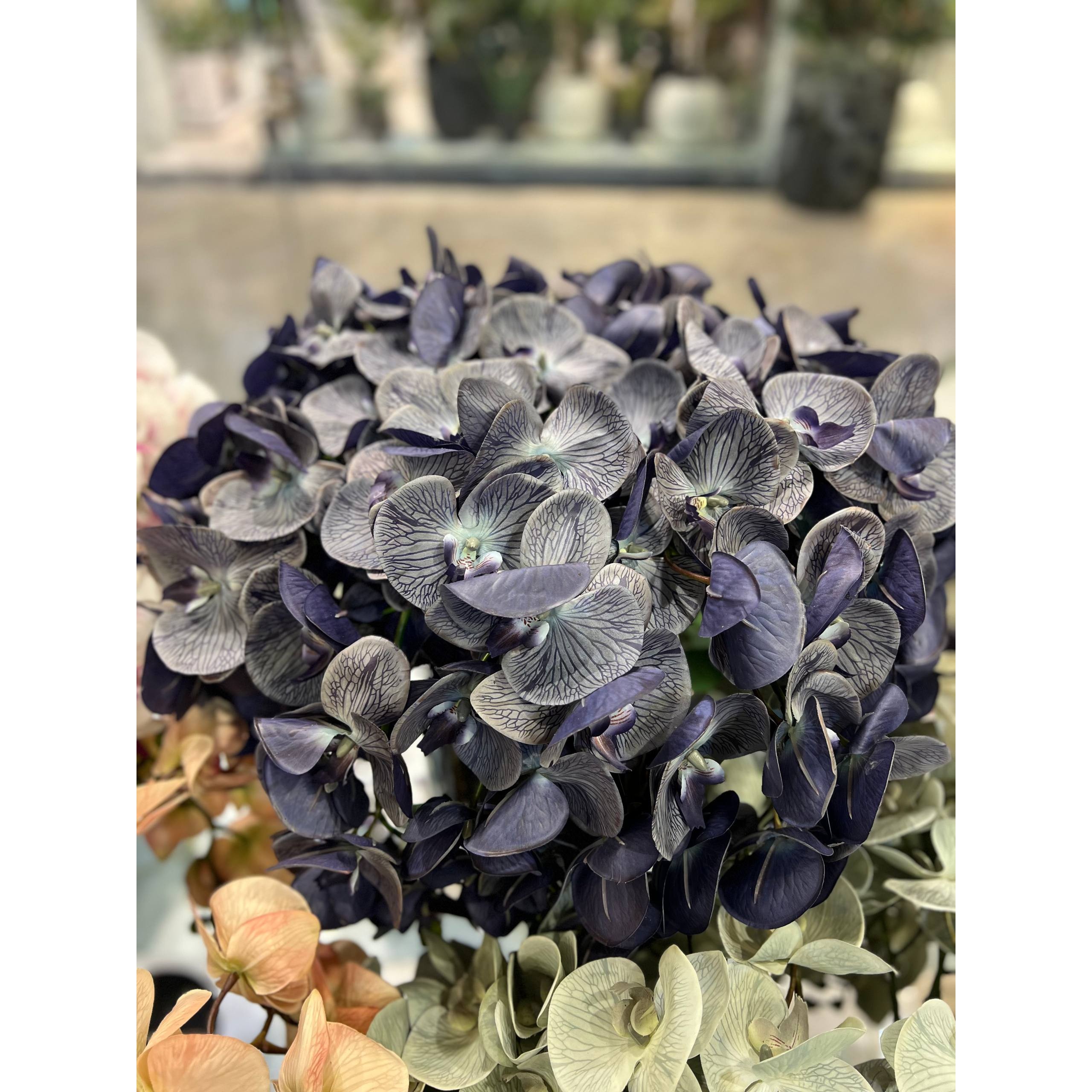 گل مصنوعی ارکیده چرمی وارداتی (تم آبی بنفش سرمه ای)