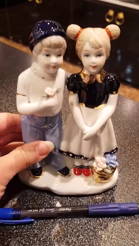 مجسمه چینی دختر و پسر