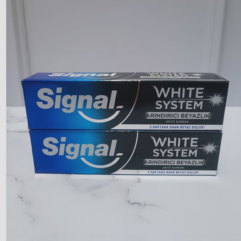 خمیر دندان زغالی سفید کننده Signal سیگنال سری white system وایت سیستم حجم 75 میل ( از بین برنده آلودگی و کثیفی دندان)