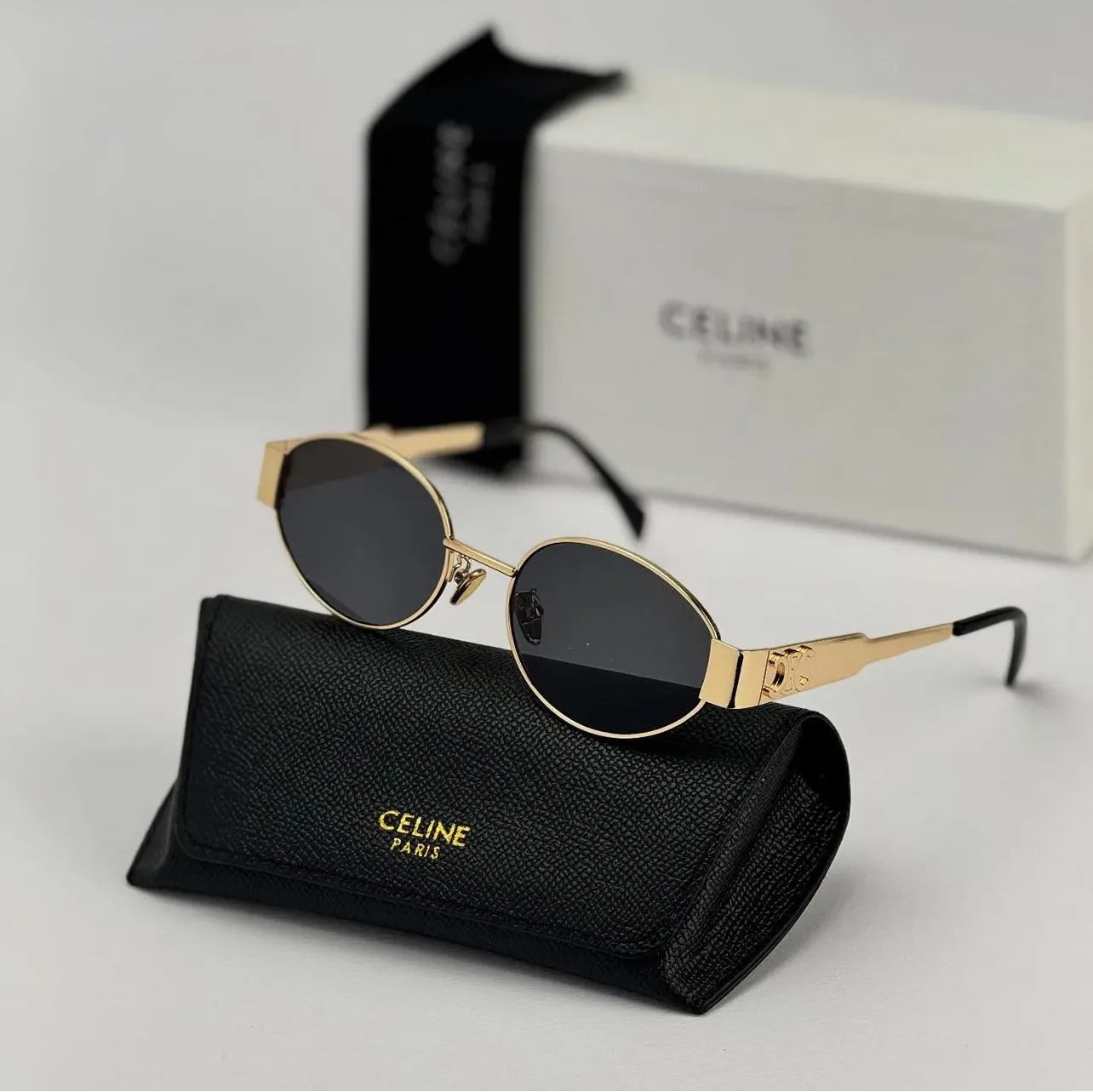 عینک آفتابی سلین CELINE بیضی طلایی مشکی کیفیت مستر به همراه کاور پارچه ای و دستمال رایگان