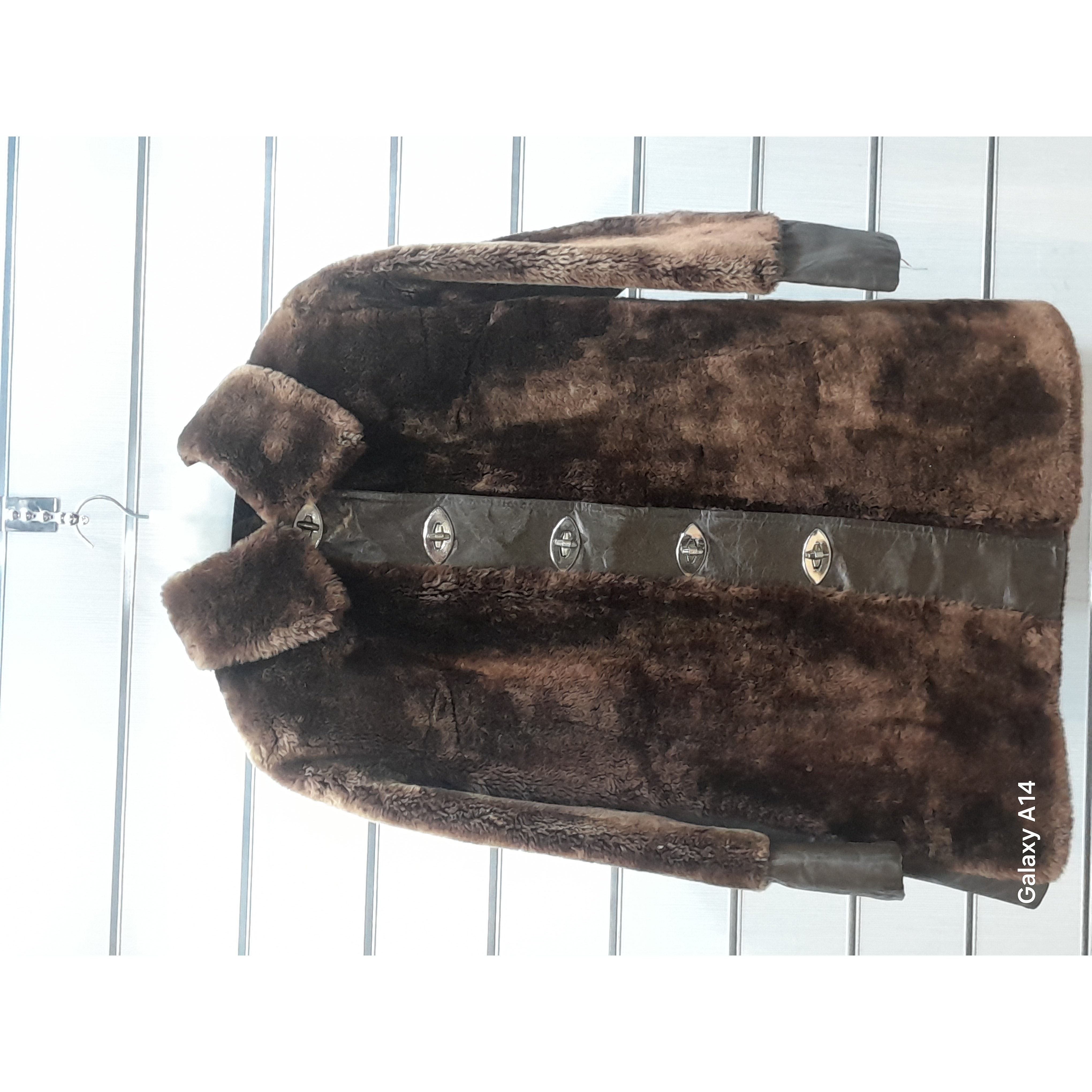 پالتو زنانه پوست گوسفندمیرینوس طبیعی برند leather SAJAD بادوام وگرمابسیار بالا