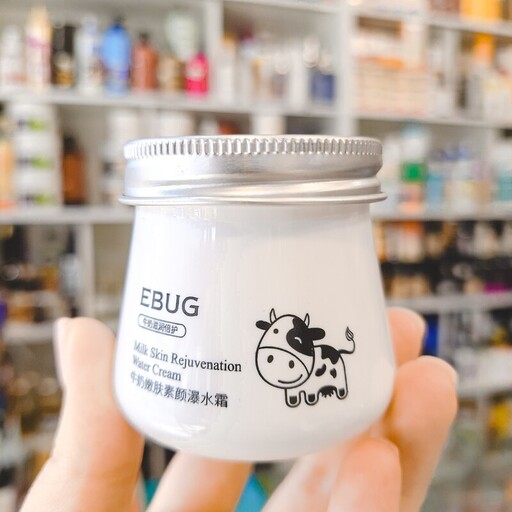 کرم مرطوب کننده و آبرسان شیر گاو ایباگ Ebug روشن کننده پوست بافت بسیار سبک فاقد چربی جذب بسیار بالا ضد لک حجم 80 گرم