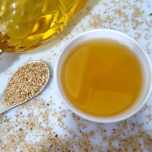 روغن کنجد اصل یک لیتری بدون افزودنی تهیه شده از کنجد دزفول