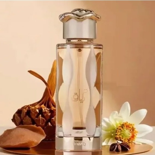 عطر زنانه لطافه تریاق Teriaq 100 میل پرفیوم تریاق کرم رایحه شیرین، میوهای و وانیلی