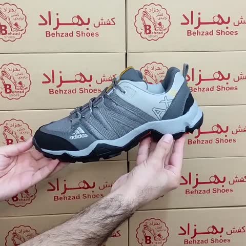 کتونی آدیداس رانینگ ax2 مردانه پسرانه سایز 41 تا 47 رنگ طوسی زیره پیو لژ 4 سانتی کفی طبی رویه چرم صنعتی و راشل خارجی 