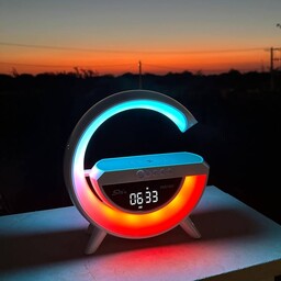 اسپیکر بلوتوثی G-شارژر وایرلس-ساعت دیجیتال-چراغ خواب-رقص نور-مدل BT-3401
