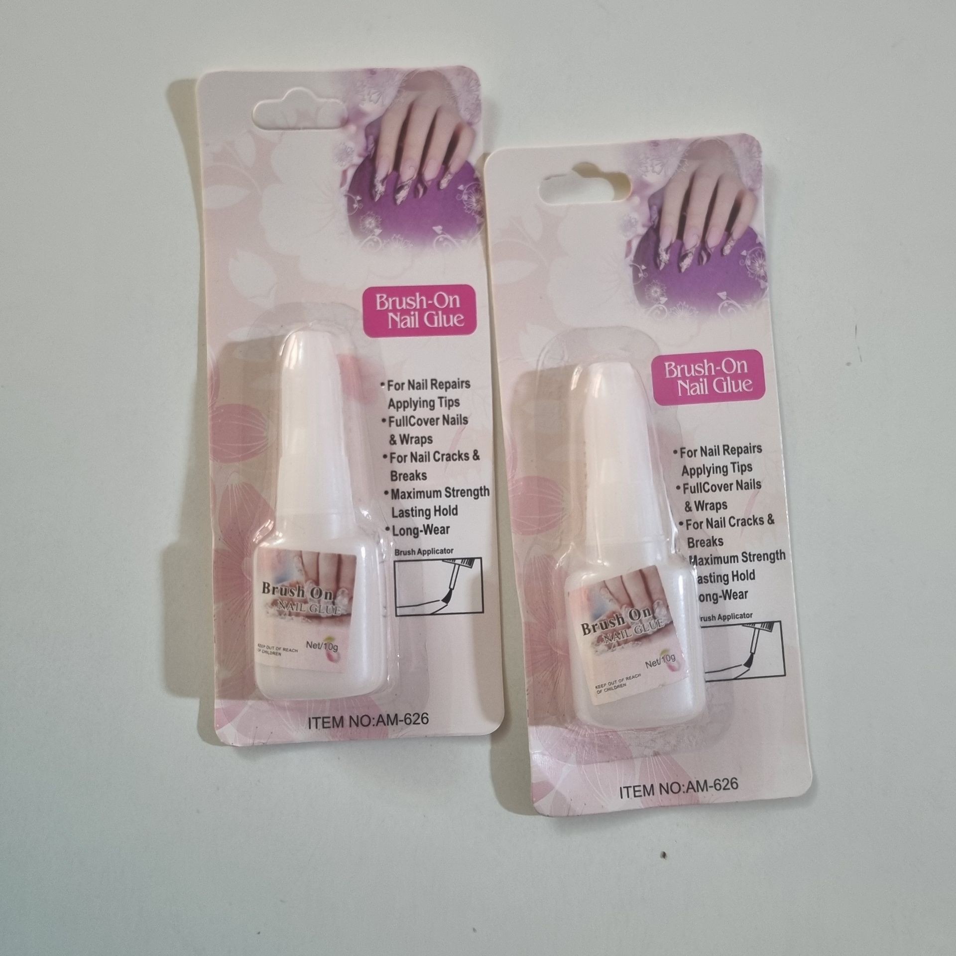 چسب ناخن Brush-On Nail Glue مدل AM-626 حجم 10 گرم